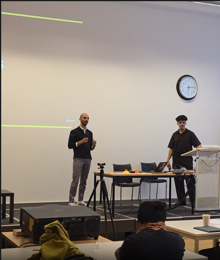 Karim Abualrish (Insytes co-founder) speaking on stage at the datathon