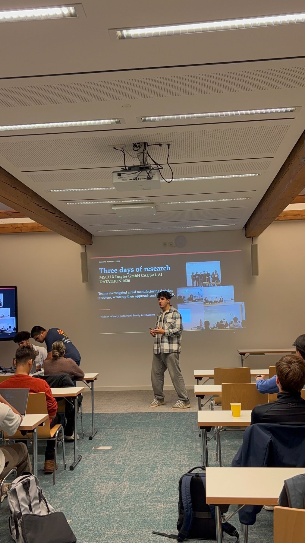 Attendees and demonstrations during the GitHub workshop