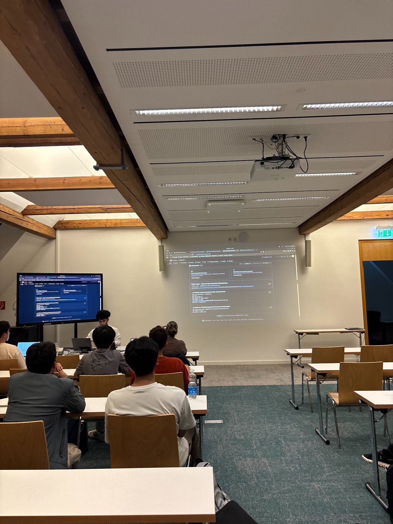 Attendees and demonstrations during the GitHub workshop