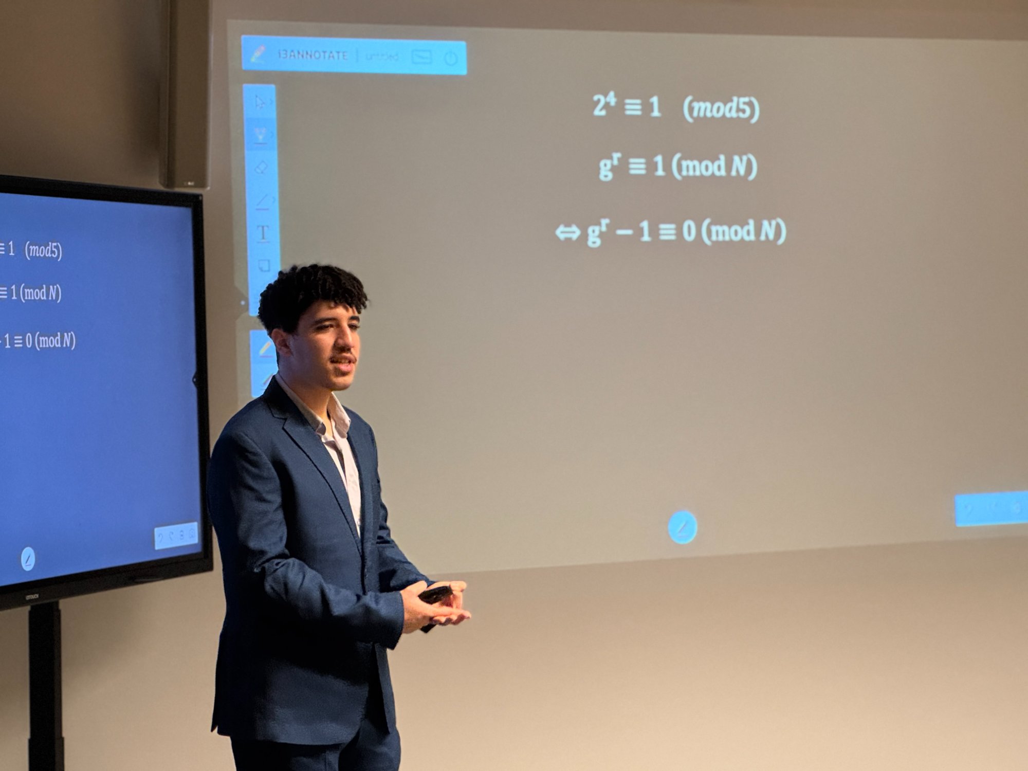 Ahmed Maghri presenting Shor's Algorithm